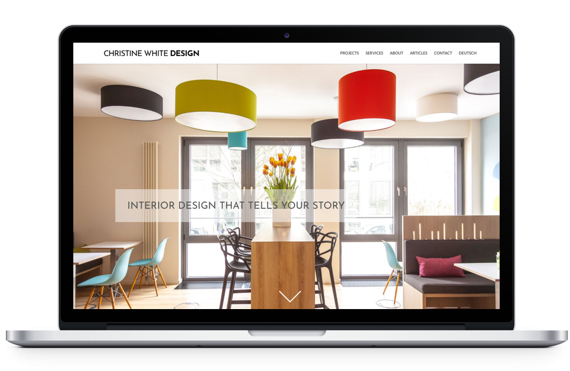 Christine White Design Home Page on laptop