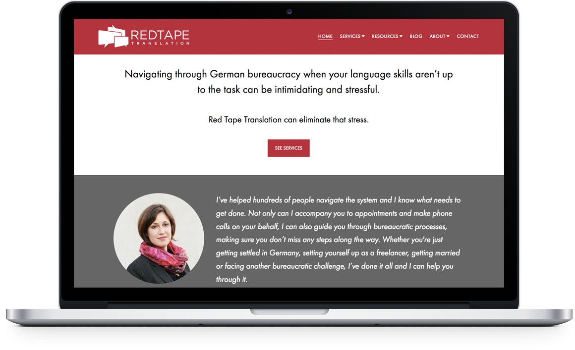 Red Tape Translation Home Page on Laptop